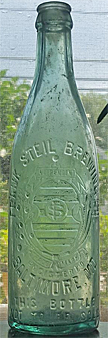 FRANK STEIL BREWING COMPANY EMBOSSED BEER BOTTLE