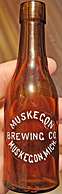 MUSKEGON BREWING COMPANY EMBOSSED BEER BOTTLE