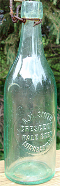A. M. SMITH CRESCENT PALE BEER EMBOSSED BEER BOTTLE