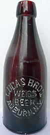 LUCAS BROTHERS WEISS BEER EMBOSSED BEER BOTTLE