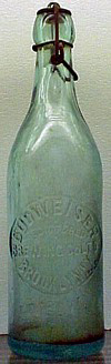 BUDWEISER BREWING COMPANY LIMITED EMBOSSED BEER BOTTLE