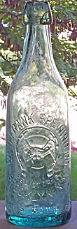 WILLIAM H. FRANK BREWING COMPANY EMBOSSED BEER BOTTLE