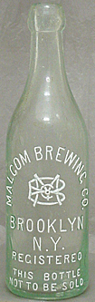 MALCOM BREWING COMPANY EMBOSSED BEER BOTTLE