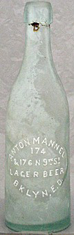 ANTON MANNEL LAGER BEER EMBOSSED BEER BOTTLE