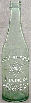 NORTH AMERICAN BREWING COMPANY EMBOSSED BEER BOTTLE