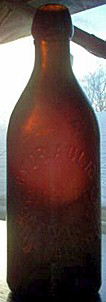 HYDRAULIC BREWING COMPANY WEISS BEER EMBOSSED BEER BOTTLE