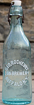 GEORGE ROCHEVOT LION BREWERY EMBOSSED BEER BOTTLE
