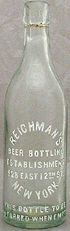 REICHMAN'S BEER BOTTLING ESTABLISHMENT EMBOSSED BEER BOTTLE