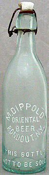 M. DIPPOLD ORIENTAL BEER EMBOSSED BEER BOTTLE