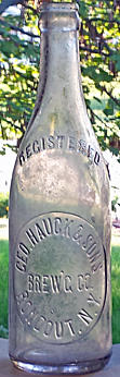 GEORGE HAUCK & SONS BREWING COMPANY EMBOSSED BEER BOTTLE