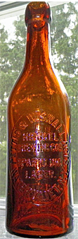 HINCKEL BREWING COMPANY'S SPARKLING LAGER EMBOSSED BEER BOTTLE