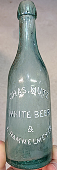 CHARLES MUTZ & E. RAMMELMEYER WHITE BEER EMBOSSED BEER BOTTLE