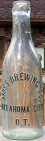 MOSS BREWING COMPANY EMBOSSED BEER BOTTLE