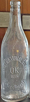 FIRST NATIONAL BREWING COMPANY EMBOSSED BEER BOTTLE