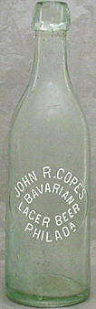 JOHN R. COPES BAVARIAN LAGER BEER EMBOSSED BEER BOTTLE