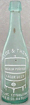 WELDE & THOMAS LAGER BEER EMBOSSED BEER BOTTLE
