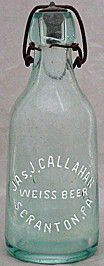 JAS. J. CALLAHAN WEISS BEER EMBOSSED BEER BOTTLE