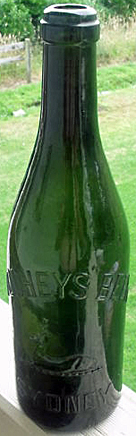 TOOHEY'S BEER EMBOSSED BEER BOTTLE