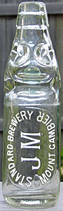 STANDARD BREWERY EMBOSSED BEER BOTTLE