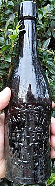 BRASSERIE BAVARO BELGE EMBOSSED BEER BOTTLE