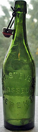 EDM. STEVENS BRASSEUR EMBOSSED BEER BOTTLE