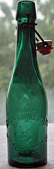 BROUWERY DE HERT EMBOSSED BEER BOTTLE