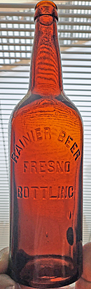 RAINIER BEER EMBOSSED BEER BOTTLE