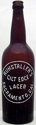 RUHSTALLER'S GILT EDGE LAGER EMBOSSED BEER BOTTLE