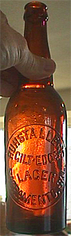 RUHSTALLER'S GILT EDGE LAGER EMBOSSED BEER BOTTLE