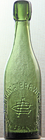 ALABAMA BREWING COMPANY EMBOSSED BEER BOTTLE