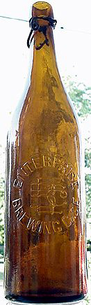 ENTERPRISE BREWING COMPANY EMBOSSED BEER BOTTLE