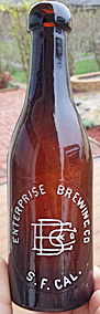 ENTERPRISE BREWING COMPANY EMBOSSED BEER BOTTLE