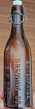 ENTERPRISE BREWING COMPANY EMBOSSED BEER BOTTLE