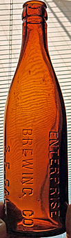 ENTERPRISE BREWING COMPANY EMBOSSED BEER BOTTLE