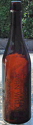 CALIFORNIA BOTTLING COMPANY JOHN WIELAND'S EXPORT BEER EMBOSSED BEER BOTTLE