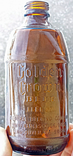 GOLDEN CROWN BEER GENERAL BREWING COMPANY EMBOSSED BEER BOTTLE