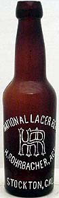 NATIONAL LAGER BEER EMBOSSED BEER BOTTLE