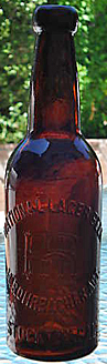 NATIONAL LAGER BEER EMBOSSED BEER BOTTLE