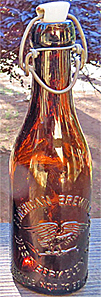 RASPILLER BREWING COMPANY EMBOSSED BEER BOTTLE