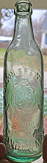 THE BRANDON BREWING COMPANY LIMITED EMBOSSED BEER BOTTLE