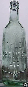 NEWFOUNDLAND BREWERY LIMITED EMBOSSED BEER BOTTLE