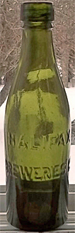 HALIFAX BREWERIES LIMITED EMBOSSED BEER BOTTLE