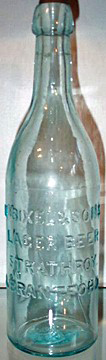 M. BIXEL & SONS LAGER BEER EMBOSSED BEER BOTTLE