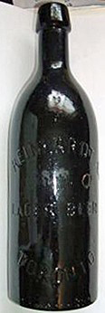 REINHARDT & COMPANY LAGER BEER EMBOSSED BEER BOTTLE