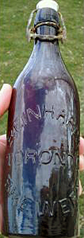 REINHARDT BREWERY EMBOSSED BEER BOTTLE