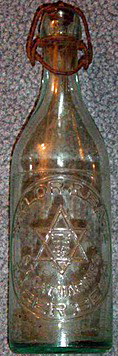 TAYLOR & BATE LAGER BEER EMBOSSED BEER BOTTLE