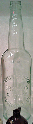 CRYSTAL SPRINGS BREWING AND ICE COMPANY EMBOSSED BEER BOTTLE