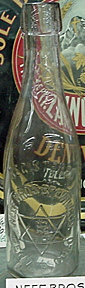 NEEF BROTHERS BREWING COMPANY EMBOSSED BEER BOTTLE