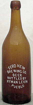 FERD HEIM BREWING COMPANY BEER EMBOSSED BEER BOTTLE