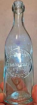 MERIDEN BREWING COMPANY EMBOSSED BEER BOTTLE